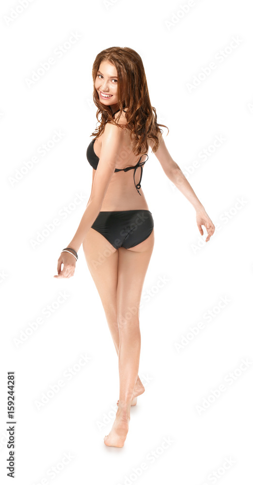 Beautiful young woman in swimsuit on white background Beautiful young woman in swimsuit on white background