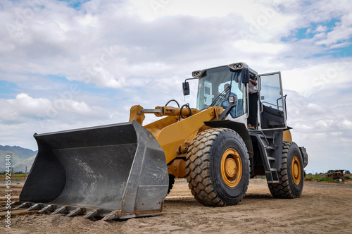 landscape photo of wheel loader in construction site