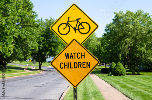 watch children and watch bicycle warning sign