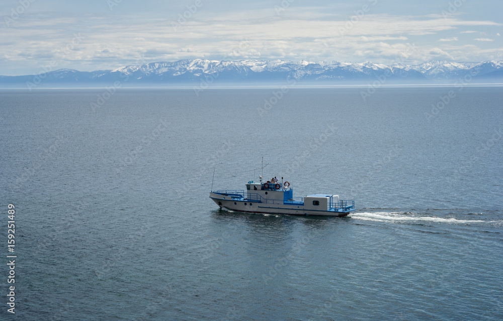 Boat in the spring in the south of Lake Baikal