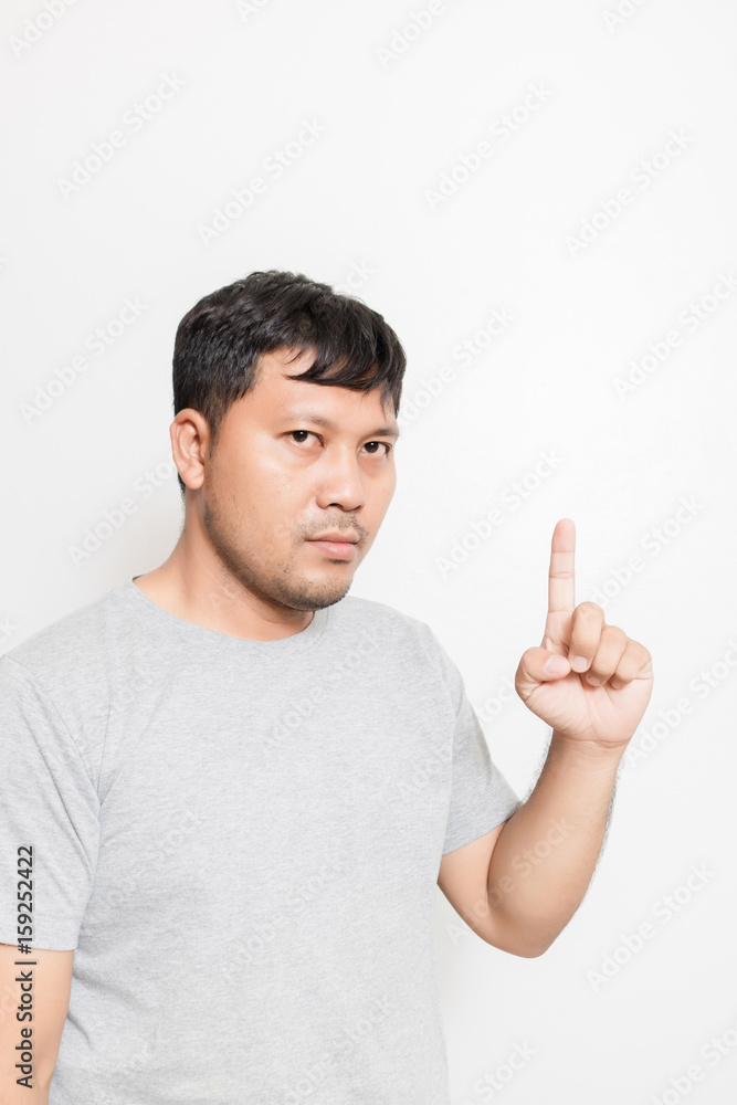 man showing something by his index finger man showing something by his index finger