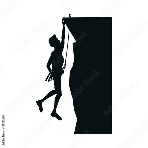 Climber arrive on the summit of a mountain peak