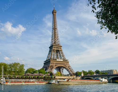 Eiffel Tower with river on the foreground in Paris © An-T