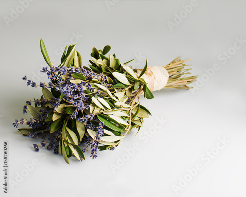 Fototapeta Naklejka Na Ścianę i Meble -  Romantic bouquet of Lavender flowers and Eucalyptus leaves in retro style on gray background. Shallow depth of field.