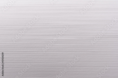 Striped smooth soft white texture with thin parallel streaks.