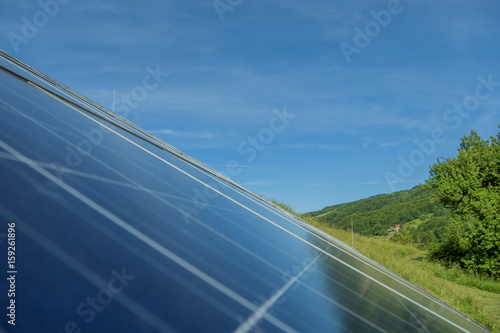 solar panels on blue sky background close-up