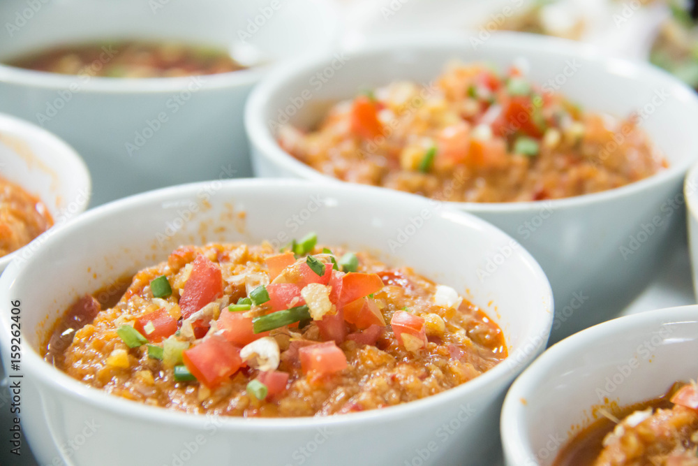 chili paste in a white bowl for asian recipes chili paste in a white bowl for asian recipes