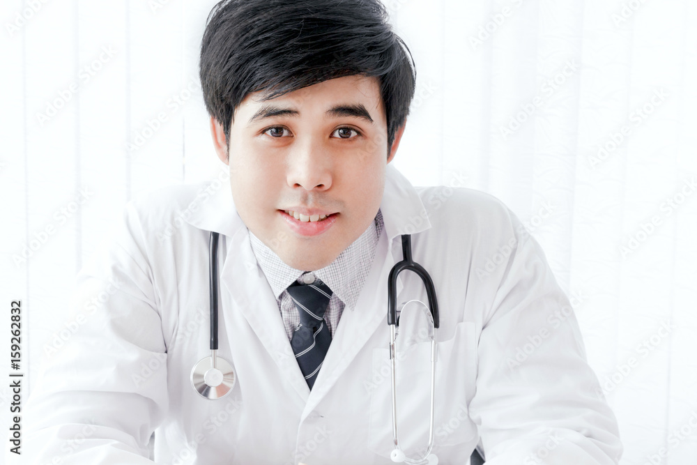 Asian doctor with stethoscope - medical and health concept Asian doctor with stethoscope - medical and health concept