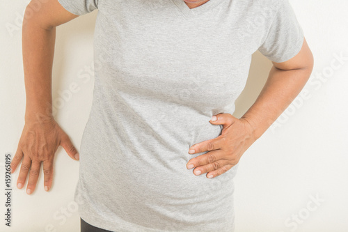 Wallpaper Mural stomachache in old women Torontodigital.ca