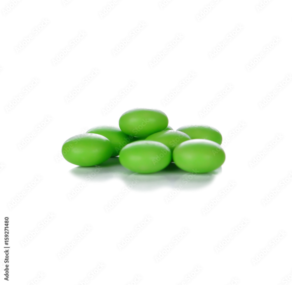 Green pills isolated on white background Green pills isolated on white background