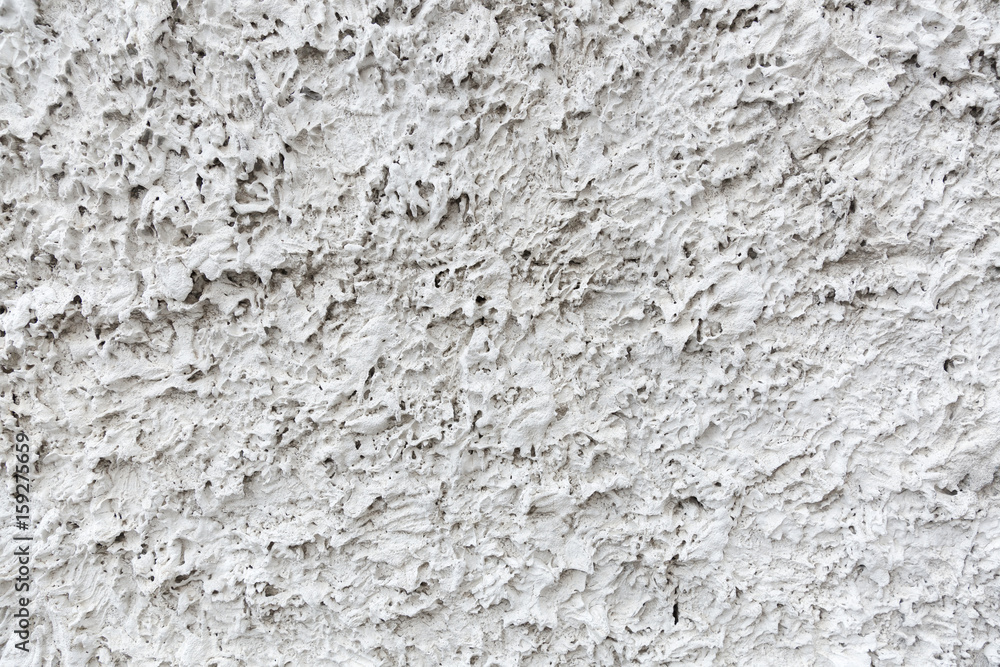 Abstract background on white texture, to show a rough of detail on cement.
