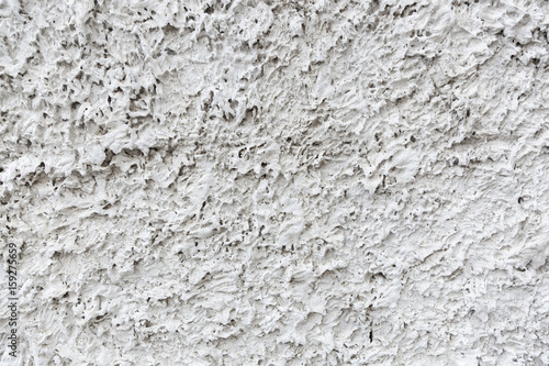 Abstract background on white texture, to show a rough of detail on cement.