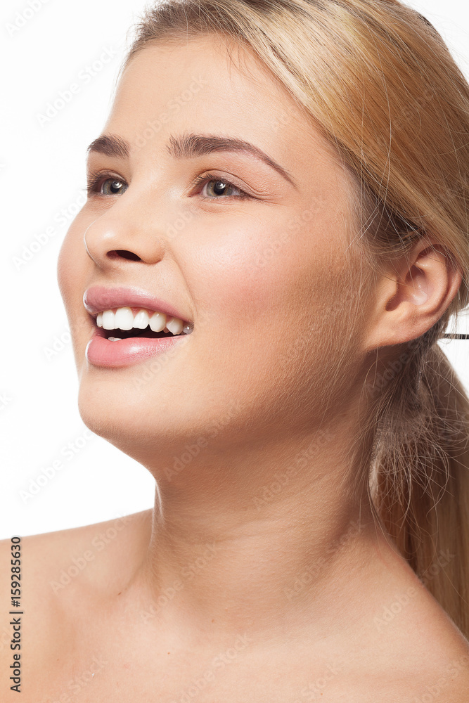 Girl smiling on white background in studio photo. Perfect white teeth Girl smiling on white background in studio photo. Perfect white teeth