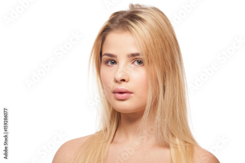 Overweight girl on white background in studio photo