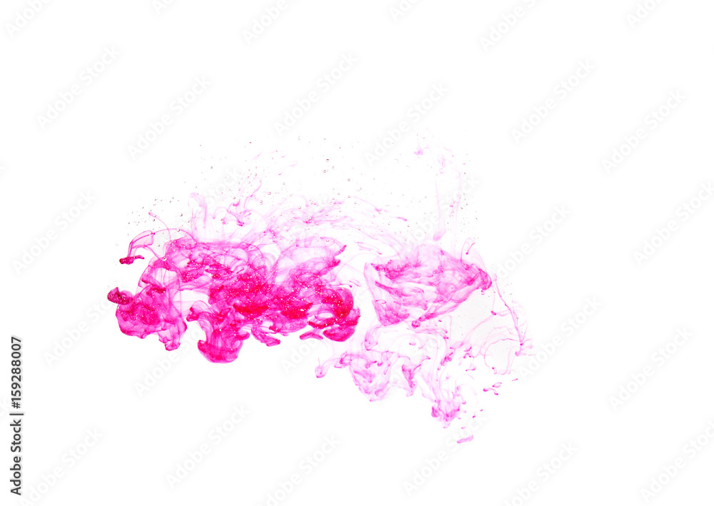 pink ink in water on a white background