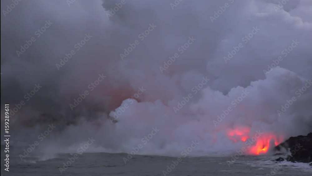 Lava flows into the ocean, Timelapse. Kilauea Volcano, Hawaii Big Island, USA.