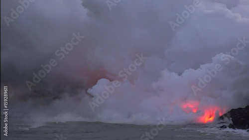 Lava flows into the ocean, Timelapse. Kilauea Volcano, Hawaii Big Island, USA.