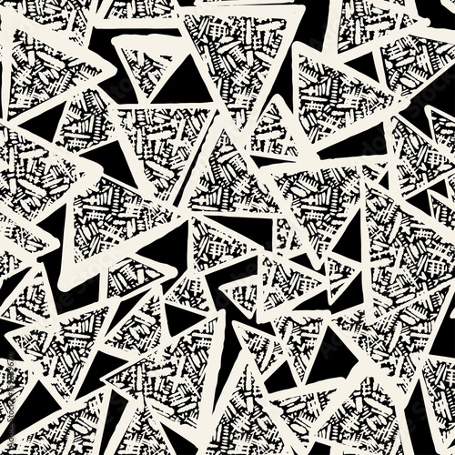 Seamless repeating textile ink brush strokes pattern in doodle grunge texture style.