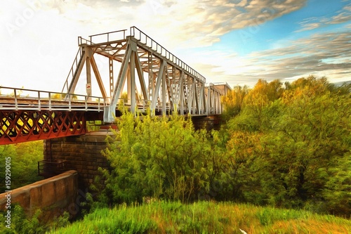 Fotografie An Iconic Old Metal Truss Railroad Bridge