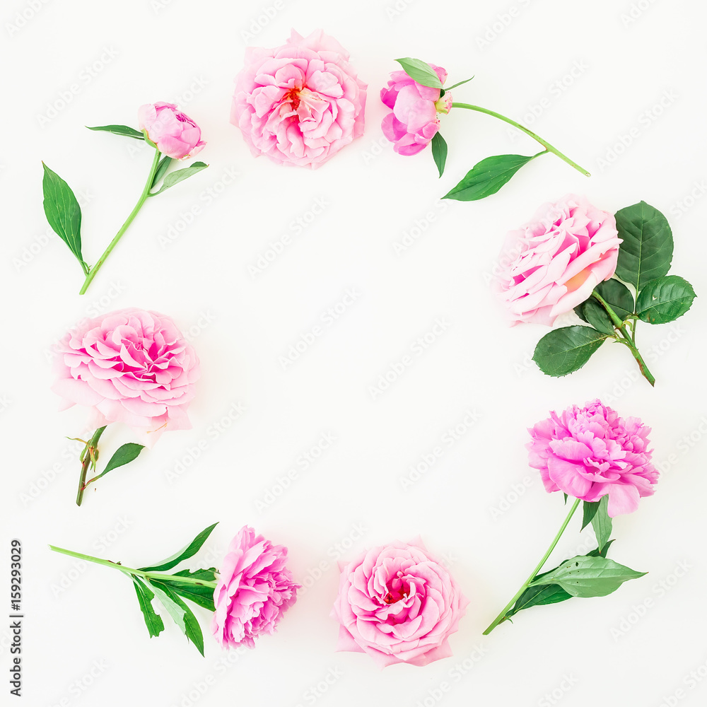 Frame of pink flowers, roses and peony on white background. Floral composition. Flat lay, top view.