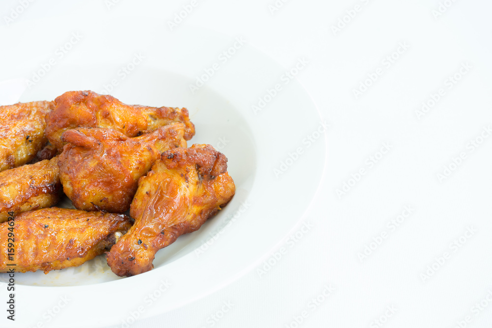 barbecue chicken wings close up on white background barbecue chicken wings close up on white background
