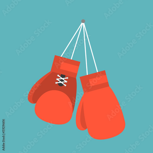 Red boxing gloves hanging on nail of wall, flat design icon