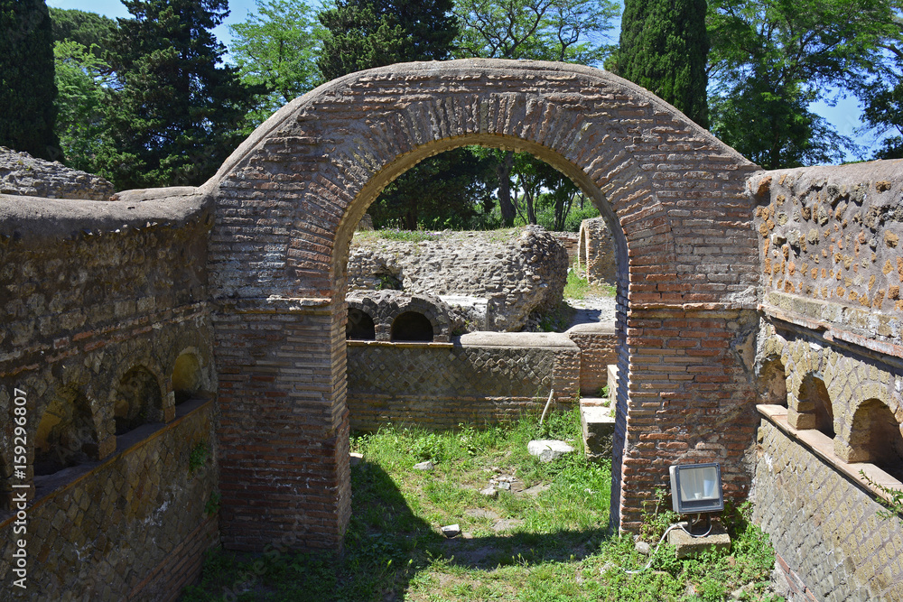 The ruins of Via Delle Tombe in Ostia Antica, Rome's ancient port before the river silted, it fell into decay with the end of the Roman empire and was abandoned in the 9th century
