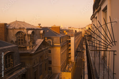 View of Paris from above at sunset. Evening in Paris. Panorama of the roofs of Paris. © Анна Скворцова