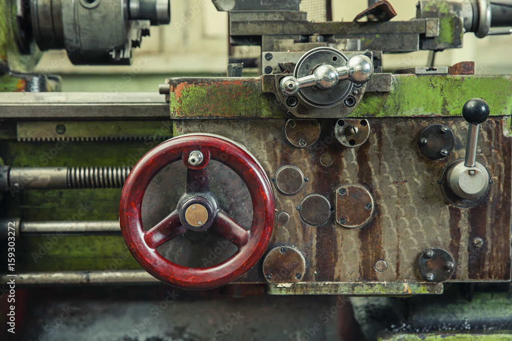 Part of turning machine for metalworking in shop, close up Part of turning machine for metalworking in shop, close up