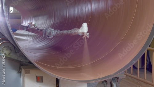 Automated machine paints the pipe from inside.