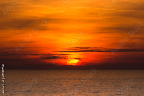Colorful cloudy sunset at mediterranean sea