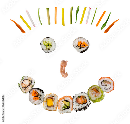 Sushi pieces in happy smile face shape, separated on white background. Popular sushi food.