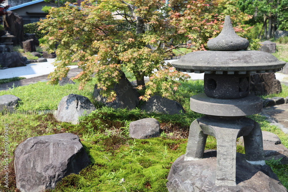 Stone lantern placed at the Japanese Garden Stone lantern placed at the Japanese Garden