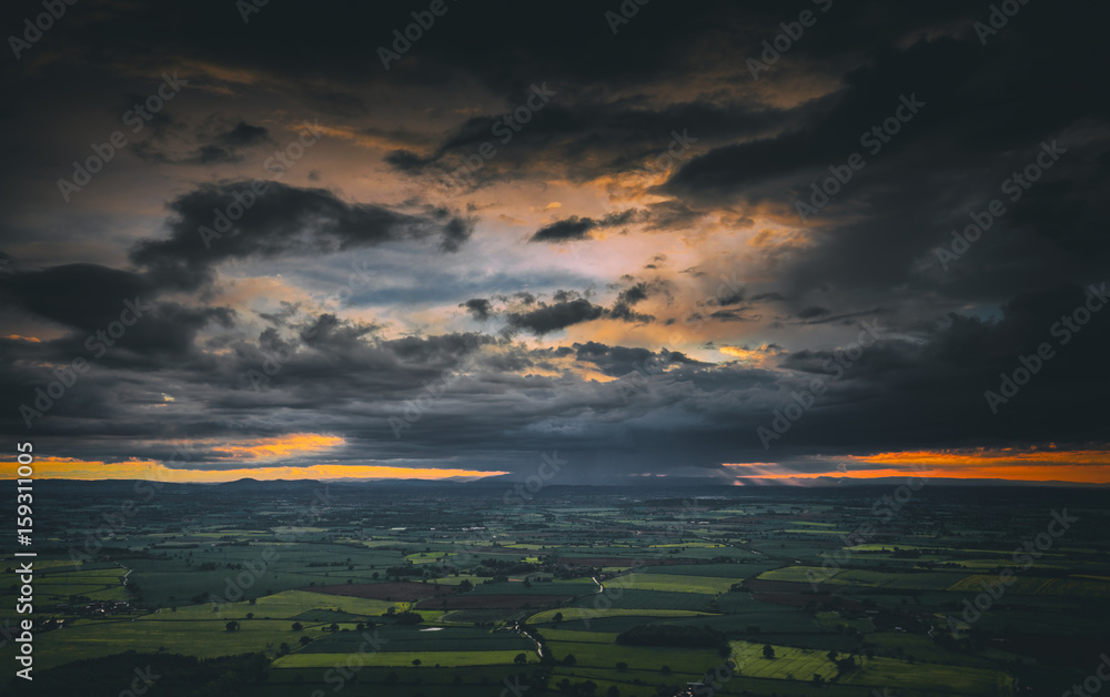 Fototapeta premium Twilight Sky with Colorful Dramatic Clouds over British Countryside