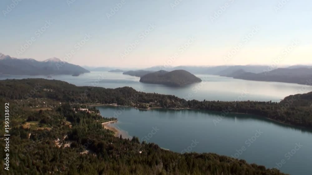 Mountain lake show quiet and calm water in Patagonia Argentina. Unique landscape of wildlife. Beautiful nature background. Travel and tourism in picturesque world of stone rocks and hills. Mountain lake show quiet and calm water in Patagonia Argentina. Unique landscape of wildlife. Beautiful nature background. Travel and tourism in picturesque world of stone rocks and hills.