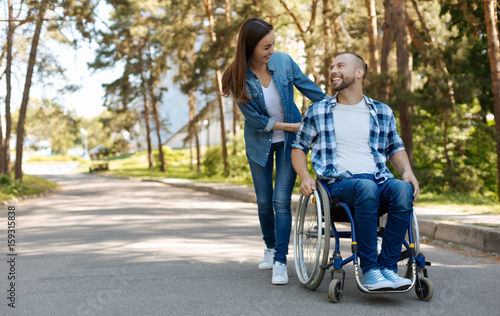 Positive delighted disabled man expressing positivity