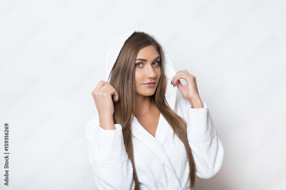 beautiful young woman in bathing robe beautiful young woman in bathing robe