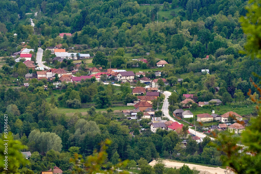 Aerial shot of a village in mountains