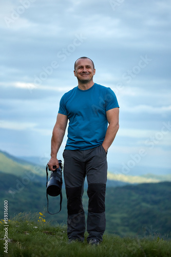 Wildlife photographer with camera