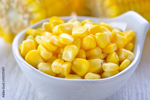 corn in a bowl on wood