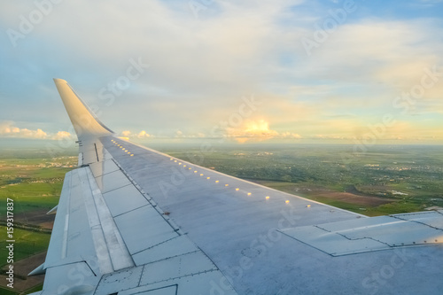 Plane wing in the sky