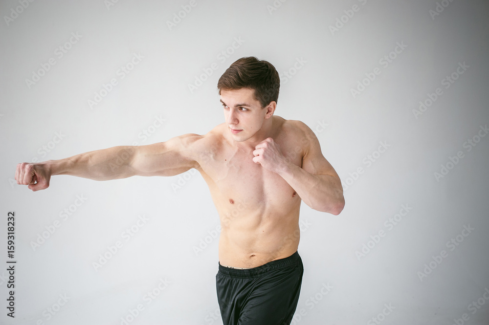 young sexy handsome men of strong Athlete's body with bare torso