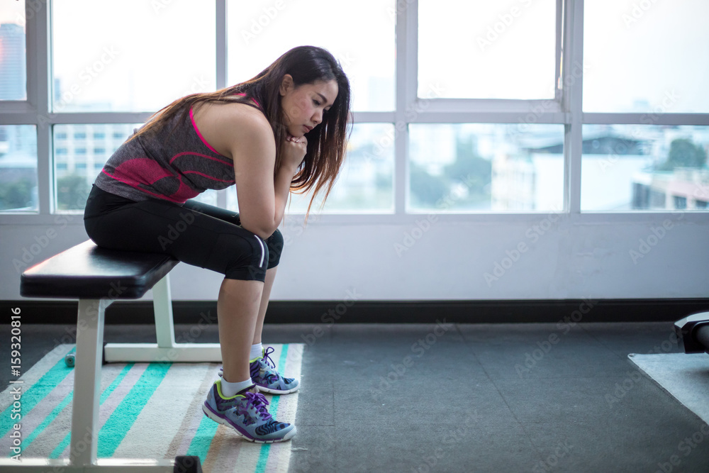 Woman frustrated and tired in sport club Woman frustrated and tired in sport club