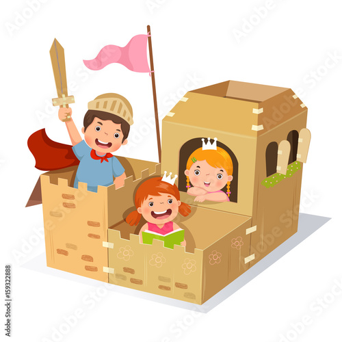 Creative kids playing castle made of cardboard box