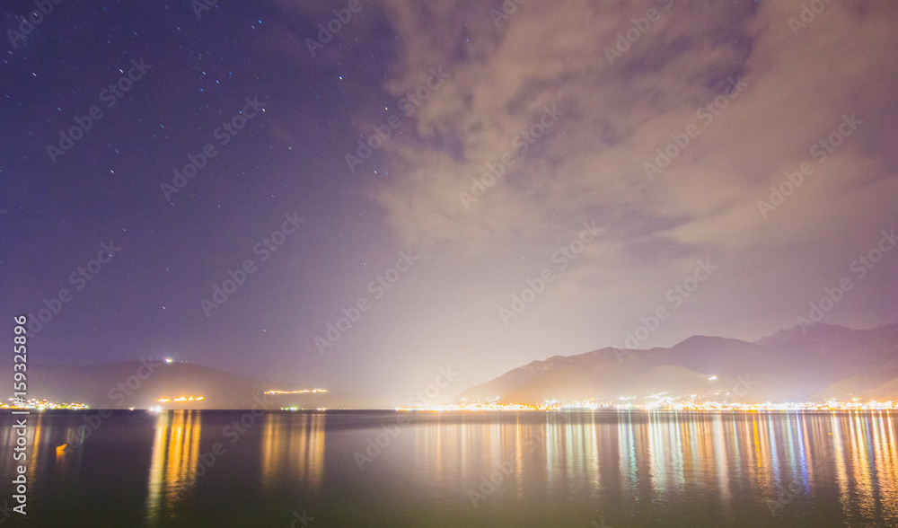 Night landscape of mountains and sea