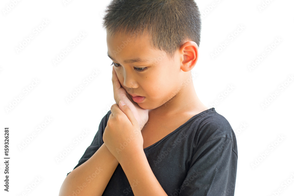 Asian boy with toothache hold his cheek with hand Asian boy with toothache hold his cheek with hand