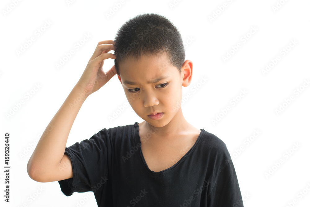 Asian boy scratching head isolated on white background Asian boy scratching head isolated on white background
