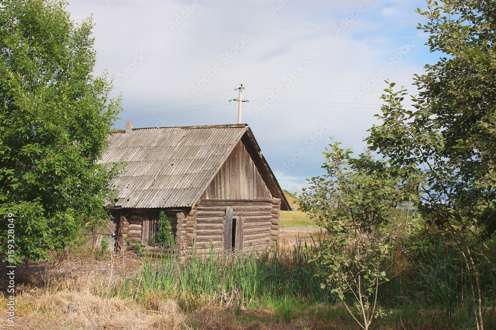 House in a field with reeds House in a field with reeds