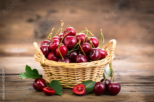 Fresh cherries in the basket photo