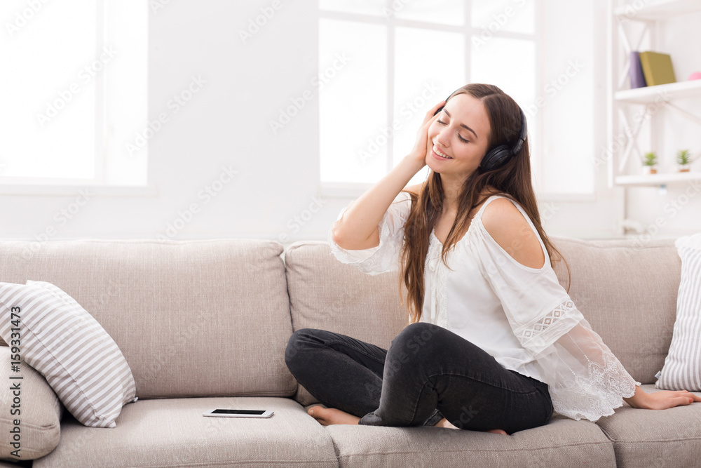 Young smiling girl in headphones Young smiling girl in headphones